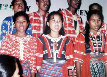 People singing in tribal dress